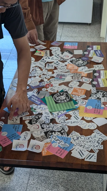 A table full of different
stickers, curl stickers can be seen over the whole table