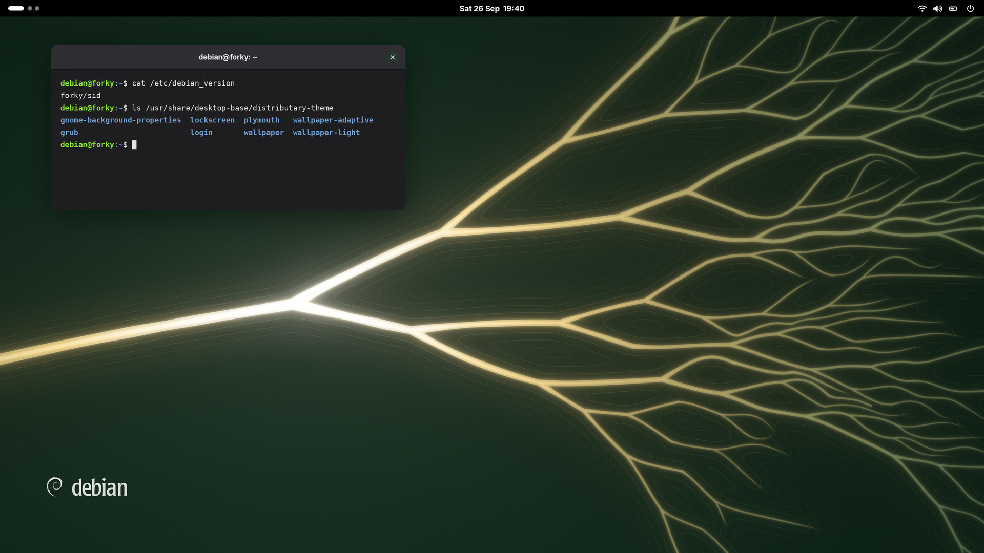 GNOME desktop with the dark wallpaper and a terminal window listing the theme's files.